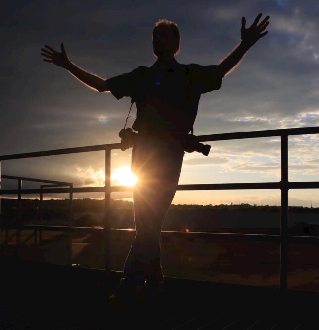 Richard poses at sunset during one of his photography classes at the Pontotoc Technology Center. The photo was made by photography student Cara Skillern.