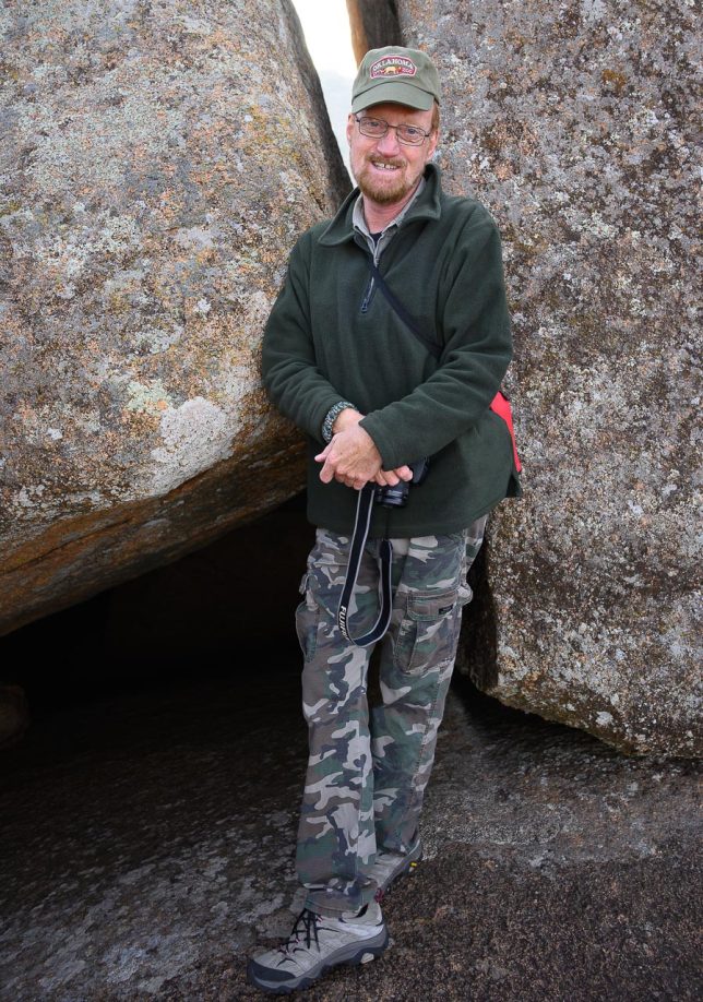 Richard hikes in southwest Oklahoma's Wichita Mountains in 2024. Richard has been visiting this location since 1971.