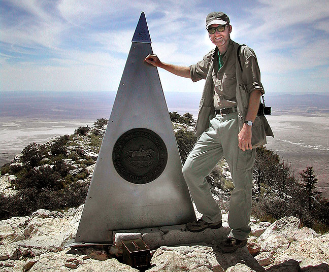 The author poses at the top of Guadalupe Peak.