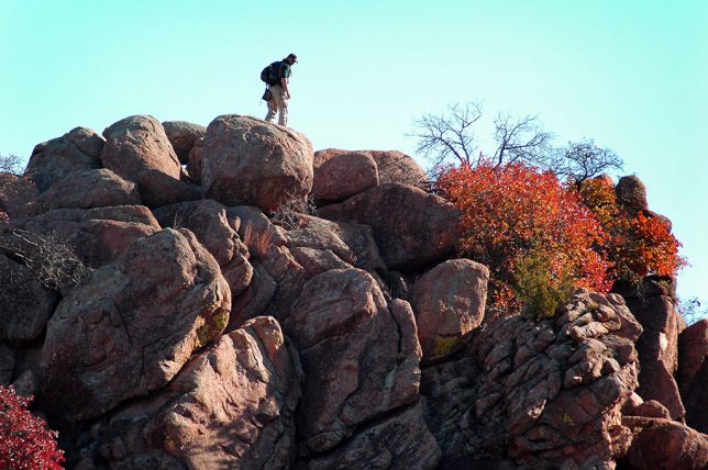 A lone hiker moves along a ridge at on The Narrows trail in November 2006.