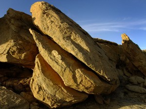 Split boulders in evening light, common to the stone landscape of Chaco.