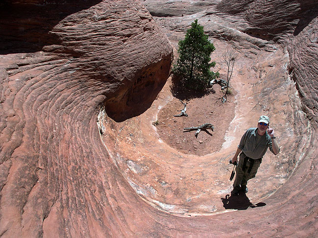Robert's image of me at the bottom of a pour-off that's part of the Peek-a-Boo trail; this is an example of what I mean when I say that all the trails at Canyonlands are more primitive than the Primitive Loop at Arches.