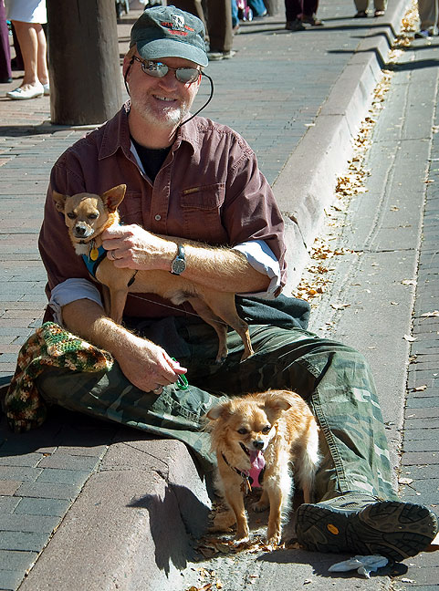 This is me on The Plaza in Santa Fe after I sat on a curb to take the dogs' sweaters off after it started to warm up.