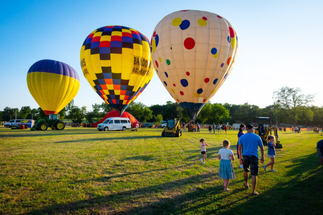 Between the afternoon balloon launch and the dusk "balloon glow," balloonists sold tethered rides for $20 per person.